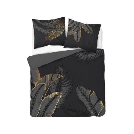 Navy blue bed linen with monstera leaves theme