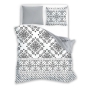 White bedding with a geometric floral arabesque motif