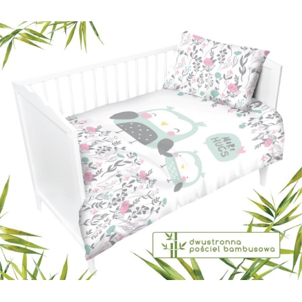 Mint and white crib bedding with floral motifs 100x135