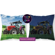 A small square pillowcase with a tractor glowing in the dark