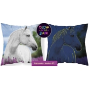 A small square pillowcase with a horse glowing in the dark