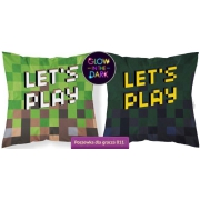 A small square pillowcase with a Minecraft pattern glowing in the dark